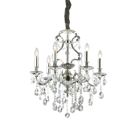 The Sonnet Crystal 6 Light Chandelier - Grey is a luxurious piece with six candle-like lights and intricate metalwork. It hangs from the ceiling, showcasing numerous dangling pendants that effortlessly combine elegance and modern features in its contemporary design, adding sparkle to any room.