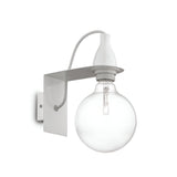 The Auburn Wall Light - White is a contemporary fixture that provides ambient lighting through its large, clear globe bulb. It highlights a minimalist design with a white base, a curved gray arm, and is elegantly connected by a sleek white wire.