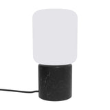 Remi Lantern Table Lamp with cylindrical black marble base and rounded square opal glass shade, shown with cable on a plain white background.