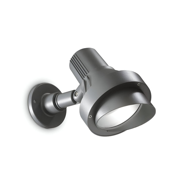 The Vespera Outdoor Large Wall Light - Grey features a sleek gray cylindrical design with an adjustable head. Made from die-cast aluminum, it combines durability and style. Its IP65 rating guarantees reliable performance against the elements, all beautifully displayed on a plain white background.