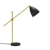 Nala Dome Adjustable Table Lamp with matt black dome shade and round marble-effect base, mounted on a counterbalanced gold arm and slim upright, shown on a plain white background.