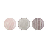 Maya Side Plate in three assorted designs on a plain white background: pink fan-like floral pattern, grey scattered floral pattern, and burgundy chevron pattern on round stoneware plates.