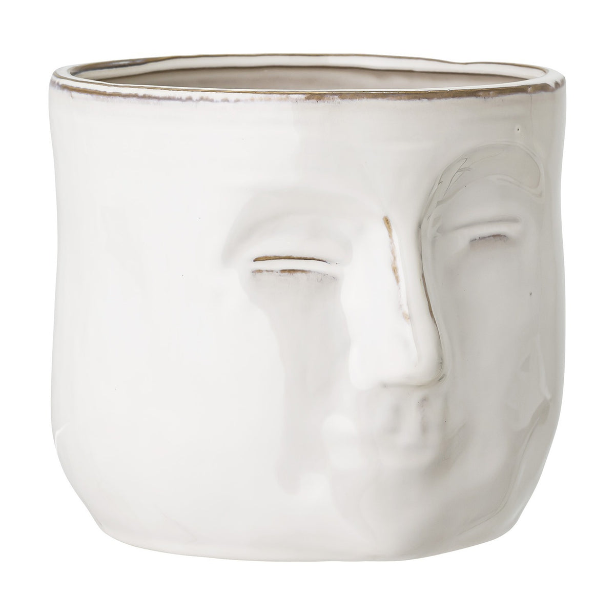 Ignacia Stoneware Plant Pot in white with a sculpted face in relief, closed eyes and full lips, rounded ceramic form on a plain background.