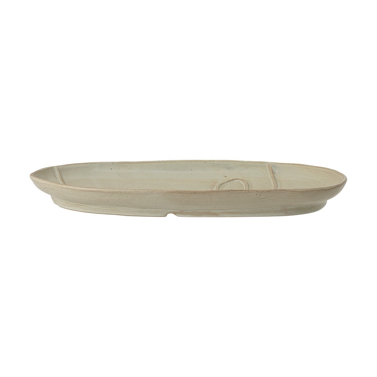 Ngan Stoneware Tray in muted green, an oval shape with a low rim and a raised line drawing resembling a face, shown side-on against a plain white background.