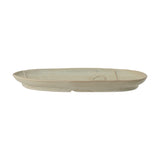 Ngan Stoneware Tray in muted green, an oval shape with a low rim and a raised line drawing resembling a face, shown side-on against a plain white background.