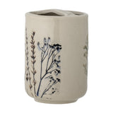 Beige crackle stoneware toothbrush cup from the Bea set, featuring a hand-painted floral motif of dried meadow stems on a plain white background.