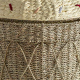 Close-up of the Cillie Seagrass Basket with Lid 72cm, showing the natural woven seagrass body with crisscross cord detail beneath a cream stitched lid edge dotted with coloured thread accents.