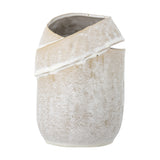 Abeera Stoneware Vase 20cm in beige, textured ceramic with a slanted wrapped band and asymmetrical opening at the top, shown on a plain white background.