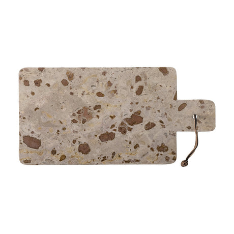 Nukaka rectangular marble chopping board in beige with brown and gold flecks, short handle with metal loop hook, shown on a white background.