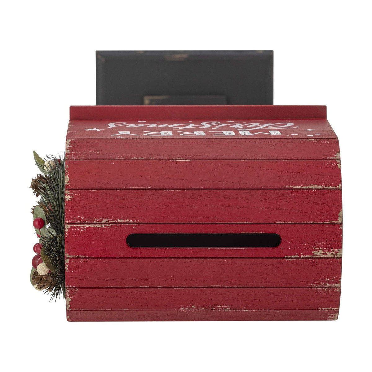 Red distressed MDF Christmas postbox with curved slatted roof, letter slot, Merry Christmas script, and a pine cone and berry wreath accent, shown on a white background.