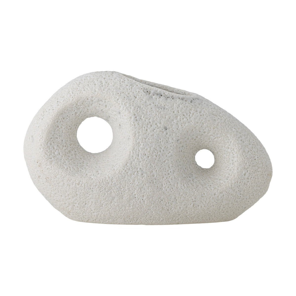 Caia Pebble Stoneware Vase 9.5cm in White, a pebble-shaped ceramic vase with two round cut-out holes and a matt, finely pitted textured surface, shown on a plain white background.