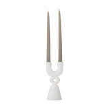 Syra Resin Candle Holder 22cm in white, sandy-textured, with two U-shaped arms holding taper candles above a ring link and flared bell base, on a plain background.