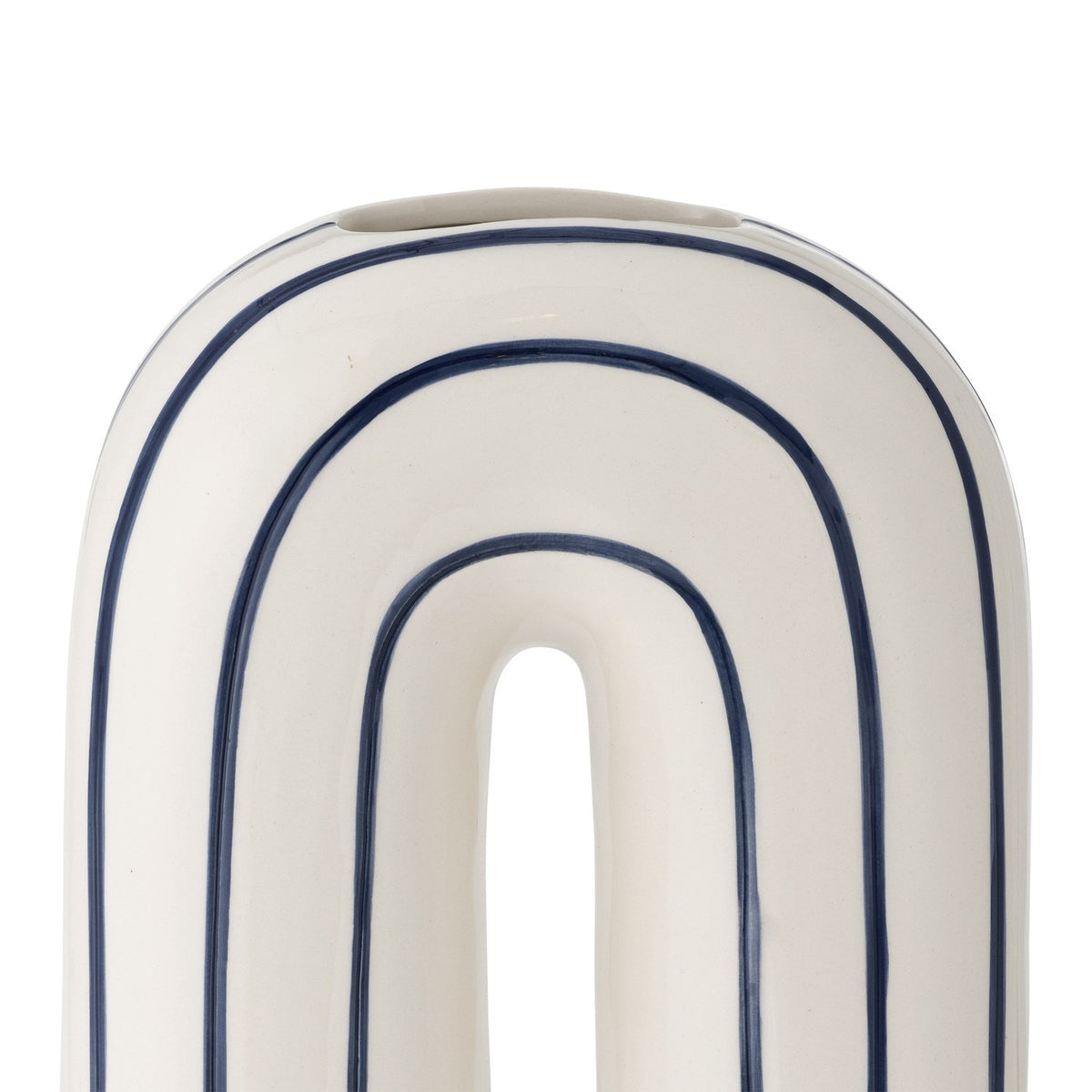 Close-up of the Mae Striped Ceramic Vase 32cm in White, showing its arched loop shape with navy blue outline stripes on a white ceramic finish, set against a plain background.