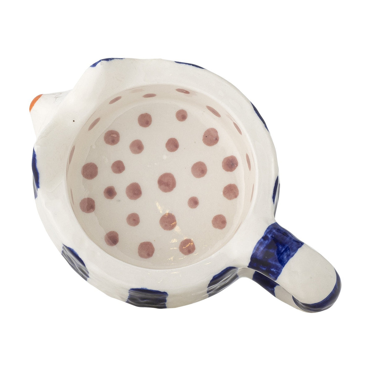 Top-down view of a Caty stoneware candle holder shaped like a cat's bowl-like back, white with blue stripes and a curled handle, interior dotted in pink, on a white background.