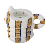 Caty Striped Stoneware Candle Holder in multicoloured bands, cat-shaped with a ribbed body, looped tail handle and pointed ears, shown on a plain white background.