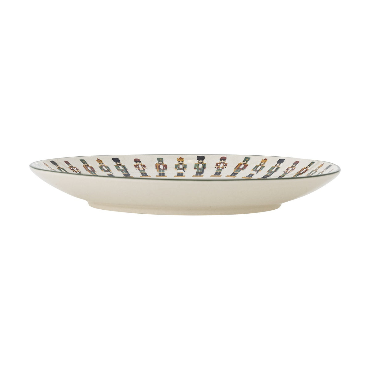 Side profile of the Jolly Stoneware Christmas Side Plate in cream, showing a shallow rim painted with marching nutcracker soldiers, set against a plain white background.