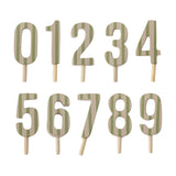 Junaid Birthday Decoration number cake toppers 0-9, wooden striped digits in green and cream on wood sticks, arranged on a plain white background.