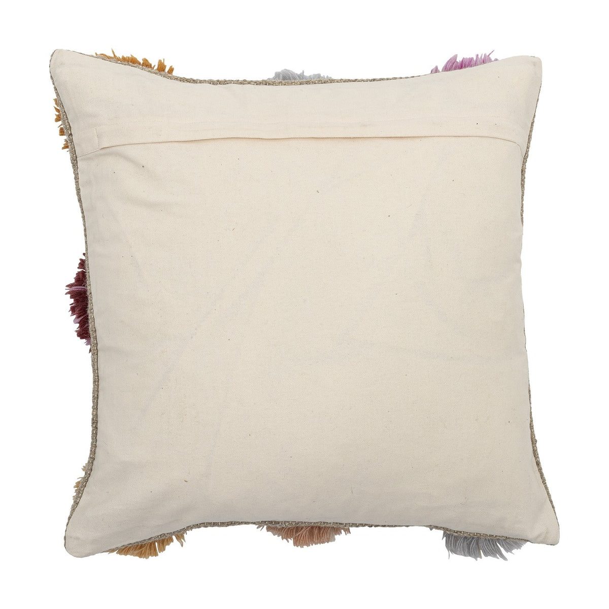 Somma Wool Cushion in Multi, reverse side shown in plain cream fabric with a concealed zip closure, colourful shaggy yarn tufts visible around the edges, on a white background.