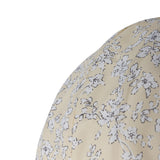 Close-up of the Pomp Floral Baby Mobile in yellow, showing ribbed fabric panels with a dense white and grey floral pattern on a hot air balloon shape, on a plain white background.