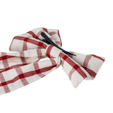 Ruby Cotton Christmas Bow in red check fabric, with rounded loops, wrapped knot, and long tails, fitted with a black clip, shown on a plain white background.