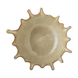 Alcott Stoneware Bowl in beige, 24x21cm, with a splash-like spiked rim and glossy glazed interior, shown from above on a plain white background.