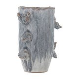 Tace Stoneware Vase 23cm in blue, cylindrical with tapered base, textured glaze and three sculpted fish heads with tails emerging on the side, shown on a plain white background.