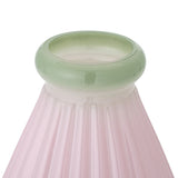 Close-up of the Judith Fluted Glass Vase 20cm in pink, showing the thick rolled green-tinted rim and vertical fluted texture against a white background.