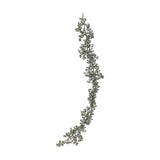 Artificial cedar Christmas garland with frosted green needle clusters trailing along a curved central stem, shown against a plain white background.