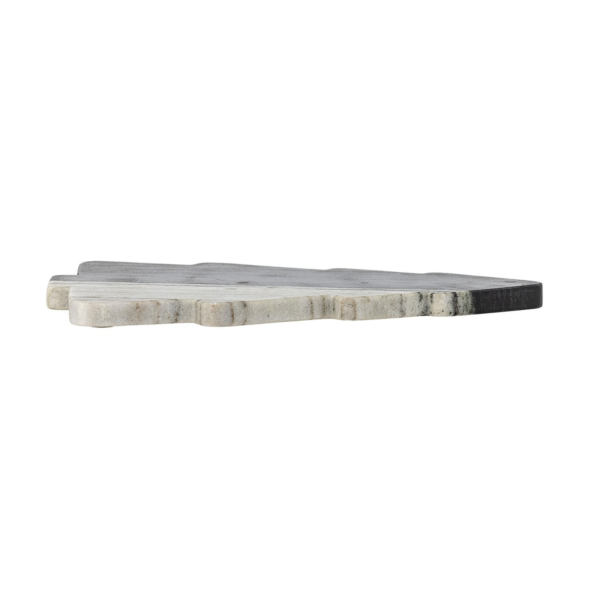 Diya Christmas Tree Marble Chopping Board in black, shown edge-on to reveal its stepped tiered profile and natural veining, set against a plain white background.