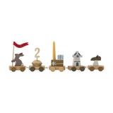 Alfi Birthday Decoration wooden train with five wagons featuring a flag-holding rabbit, cupcake with number topper, candle and gift, windmill, and mushroom with ladybird, on a white background.