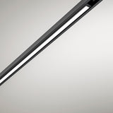 Close-up of the Street Line Linear LED Track Spotlight in black, showing a slim bar with a continuous illuminated white diffuser strip, set against a plain light background.