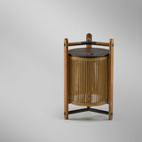 Kando M/40/R rechargeable outdoor table lamp with sand nautical cord cylinder shade, teak wood uprights, and dark top and base, shown on a plain light background.