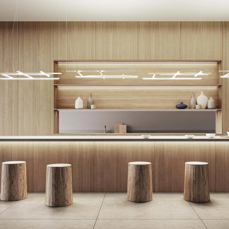 Hilow Black Diffuser Frame LED pendant lights with linear bar grids suspended above a wood-panelled bar counter with log-style stools.