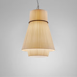 Folie S/70.2 tiered pendant light with cream translucent ribbon shade in fine vertical pleats, slim black ring at the top section, shown on a plain light grey background.