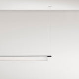 Ombra Fabric LED Pendant Light, 165.2cm long cylindrical off-white diffuser on a black top rail, suspended from a single cable against a plain white ceiling and wall.