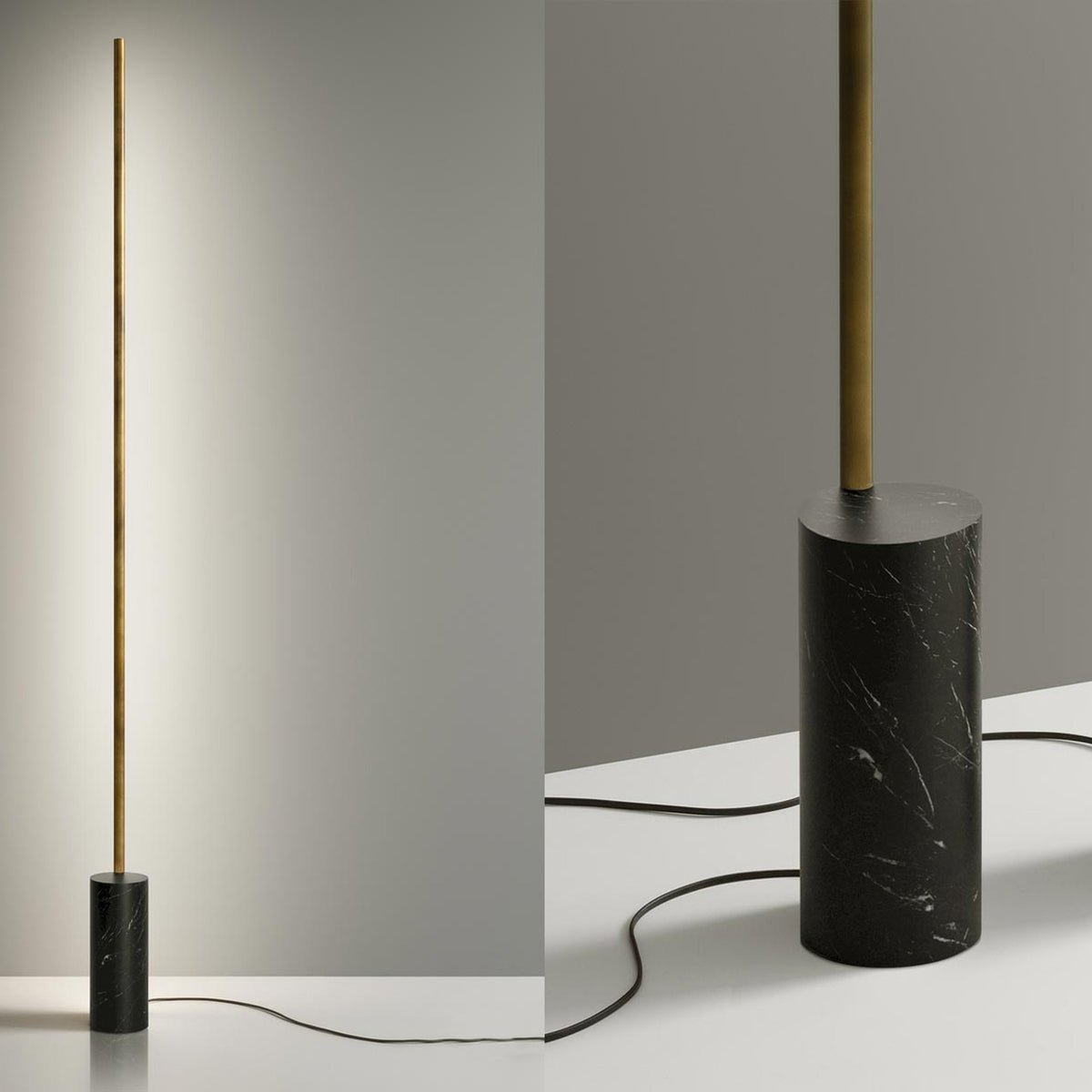 Hilow Line Nero Marquina linear floor lamp with slim brushed brass rod and black, white-veined marble cylindrical base, shown lit against a plain grey background and in close-up detail.