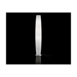 Maxi P/03 Ribbon Cylinder Floor Lamp with a tall, tapered pleated white shade on a round base, shown illuminated against a black background.