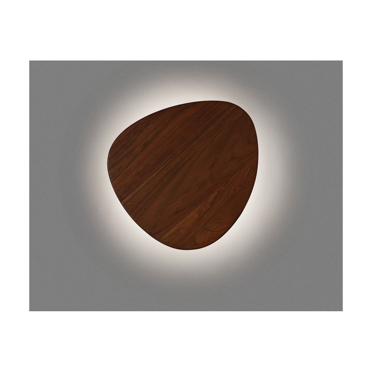 Tria 05 Wood LED outdoor wall light with a flat, pebble-shaped teak wood face, glowing with a soft warm-white halo against a grey background.