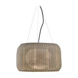 Fora S Drum LED Outdoor Pendant Light in Light Beige, a woven drum shade suspended on three fine wires, shown glowing softly against a plain white background.