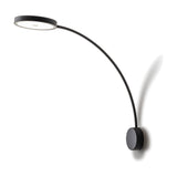 Dip Disc LED Wall Light in matt black, featuring a round wall plate with a long curved arm extending to a flat circular disc head, shown on a plain white background.