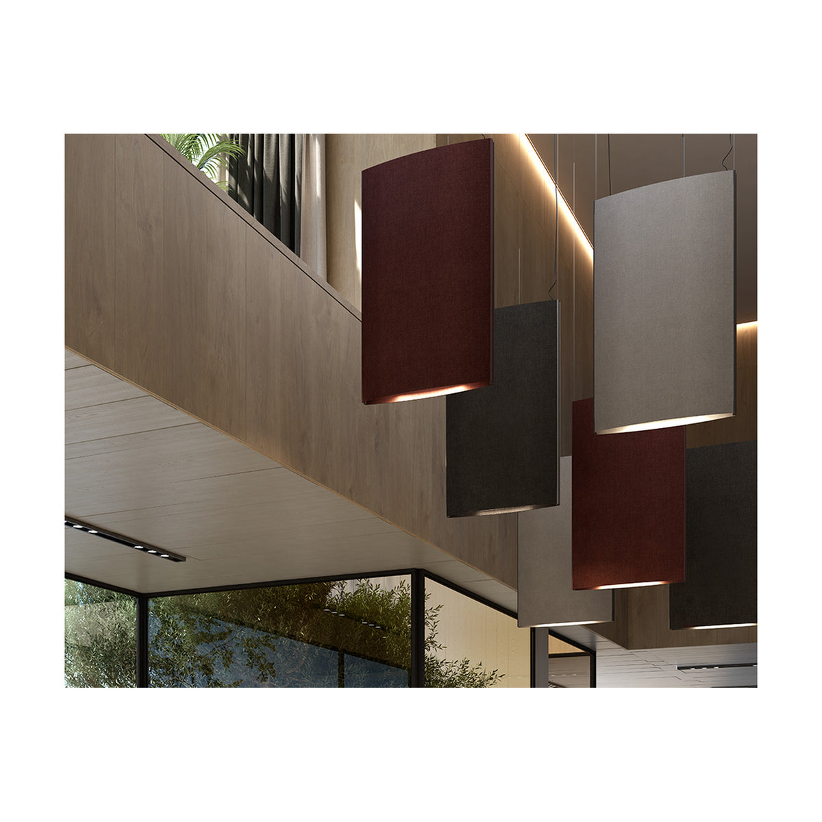 Noren S/72 fabric LED pendant light in dark grey, shown as a tall curved panel among multiple similar pendants in a wood-panelled interior with glass partitions.