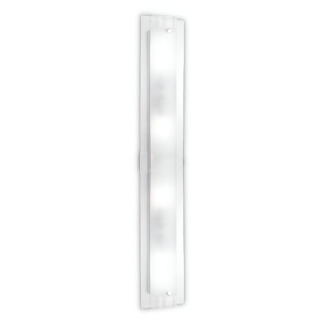 The Allure 4 Light Wall Light - White is a sleek, rectangular wall sconce with a frosted glass cover mounted vertically. This modern lighting fixture emits a soft white light and ambient glow, making it perfect for contemporary interiors.