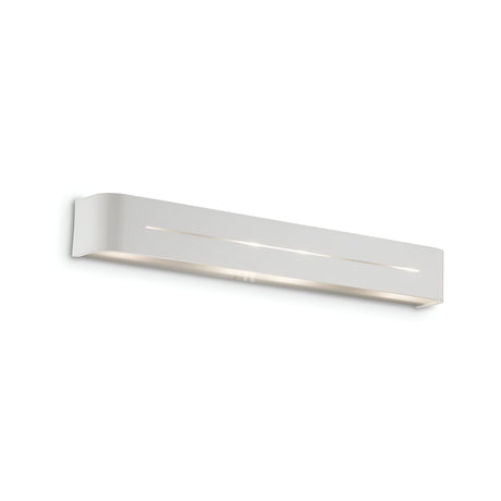 The Flare 4 Light Wall Light in a sleek, minimalist design enhances the plain white wall with its modern, rectangular shape and silver finish. Its dimmable settings provide soft illumination, emphasizing its contemporary style.