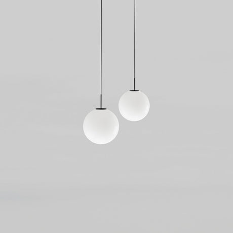 Mika Opal Glass Globe Pendant Light in Matt Black, two globe pendants of different sizes on black cables with matt black canopies, shown on a plain grey background.