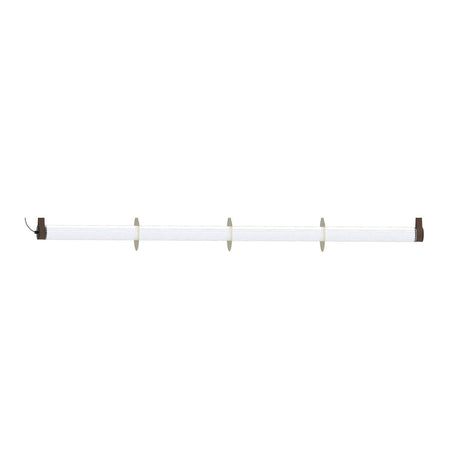 Roseline LED Ribbed Glass Linear Pendant Light, a long fluted glass bar with three gold discs and brown ceiling straps, shown on a plain white background.