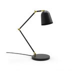 Tessa Articulated Dome Adjustable Table Lamp in matt black with gold joints, featuring a jointed arm, round base, and dome shade on a plain white background.