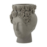 Akira Stoneware Vase 30cm in grey, shaped as a woman's closed-eyed face with a crown of raised roses around the rim and temples, matt textured finish, on a plain white background.