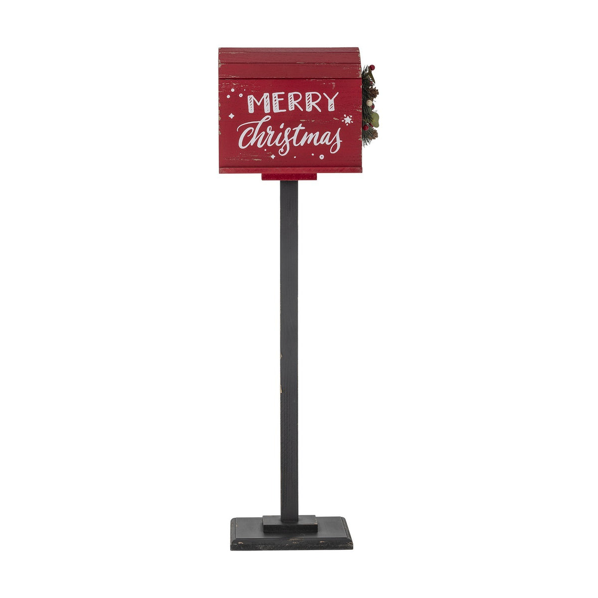 Red MDF Carlo Christmas postbox decoration with slatted roof, Merry Christmas lettering, and a small pine cone and berry wreath, on a tall black stand.
