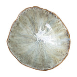 Joby Stoneware Bowl 24cm in green, a round stoneware bowl with wavy irregular rim, streaked green glaze radiating to a pale glossy centre, shown on a plain white background.
