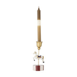 Merry-go-round resin Christmas candle holder with a painted carousel horse on a gold rod, round red-and-white striped base, gold candle cup, and taper candle, shown on a white background.